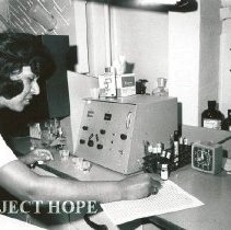 Louise Ortega, Medical Technologist, working in the Chemistry lab.